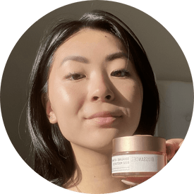 @macyhung, a young woman with dark hair holding jar of biossance squalane + vitamin c rose moisturizer